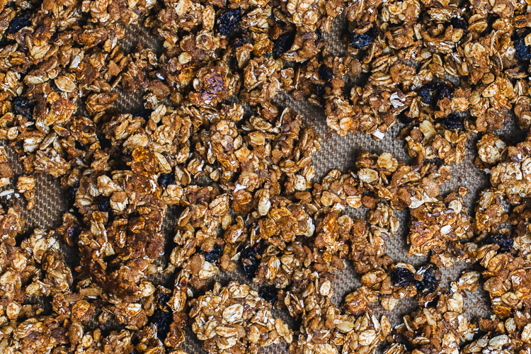 oatmeal cookie granola on baking sheet out of oven
