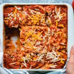 finished vegan enchilada lasagna, slice missing from dish