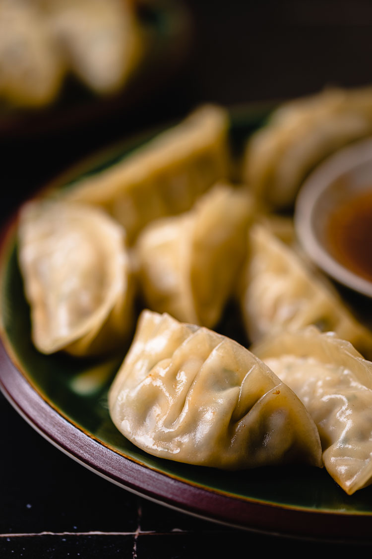 close up of a plate of gyoza