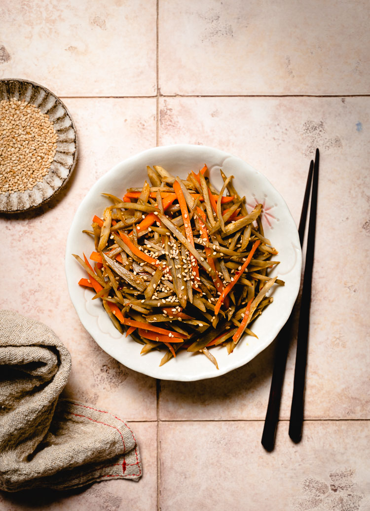 overhead shot of kinpira gobo on a plate