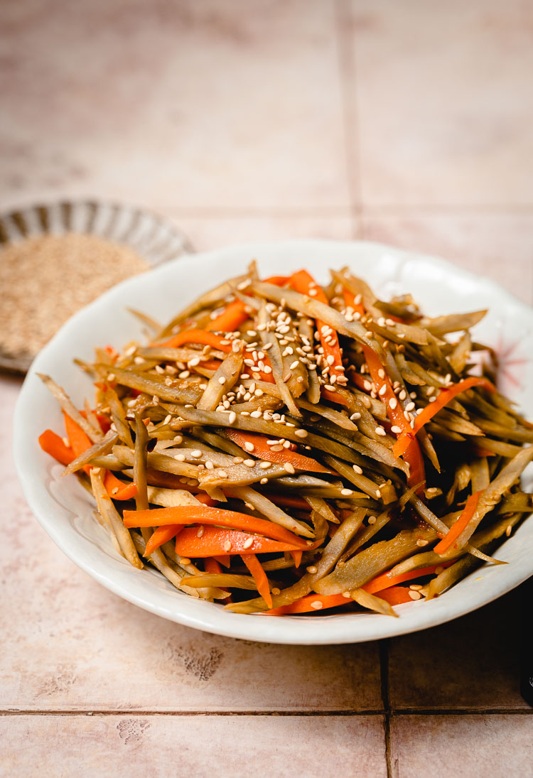 close up kinpira gobo on a plate