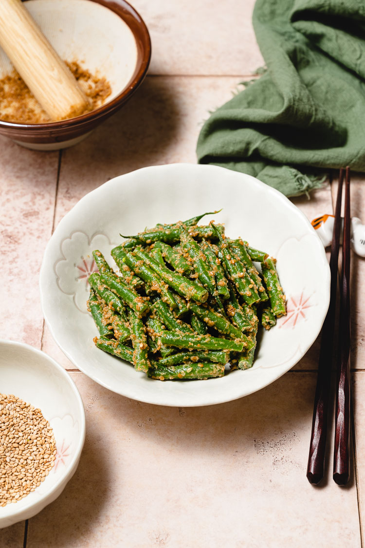 green bean gomaae in a bowl, shot at an angle