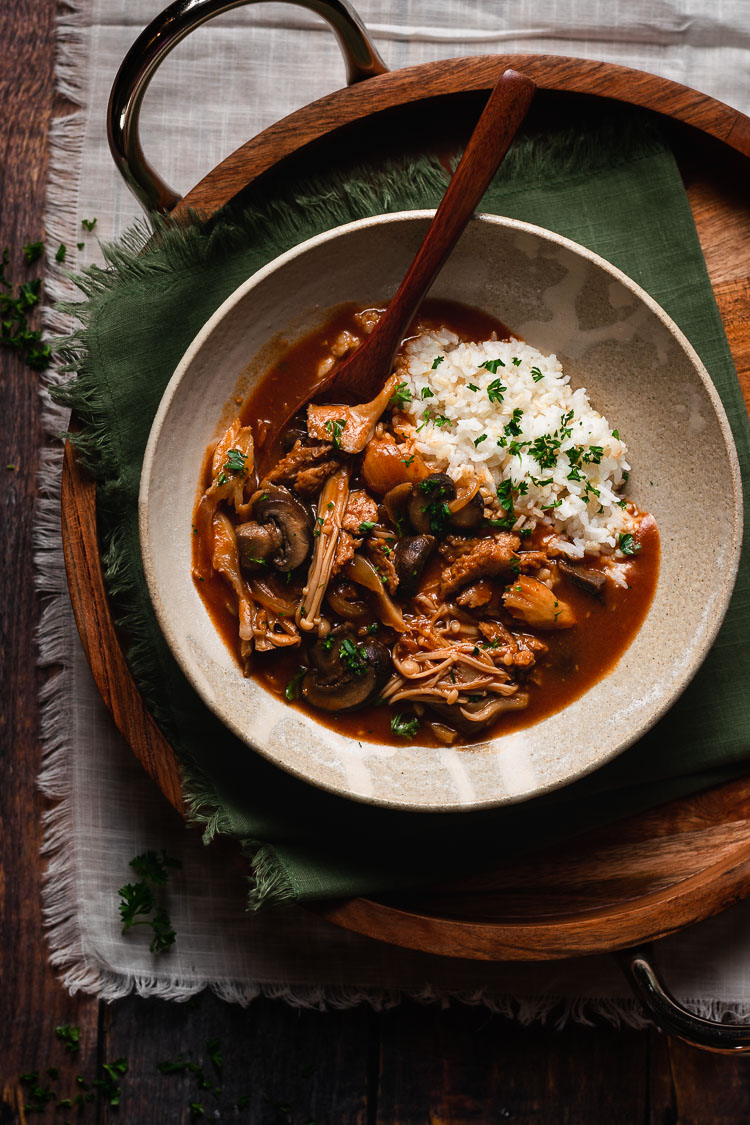 vegan hayashi rice in a bowl with a spoon