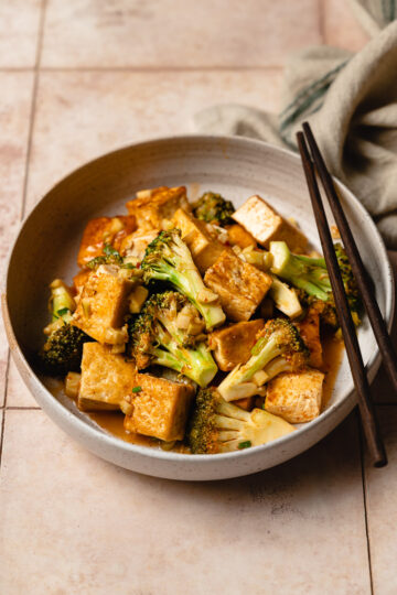 bowl of chili sauce tofu with chopsticks