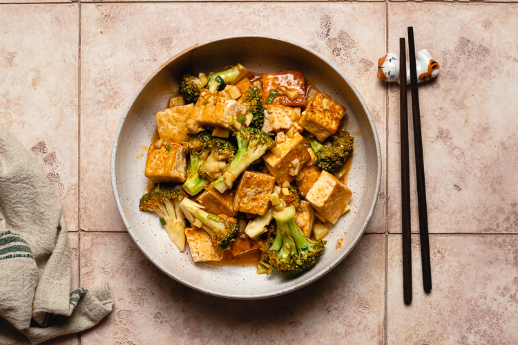 chili sauce tofu and broccoli in a bowl