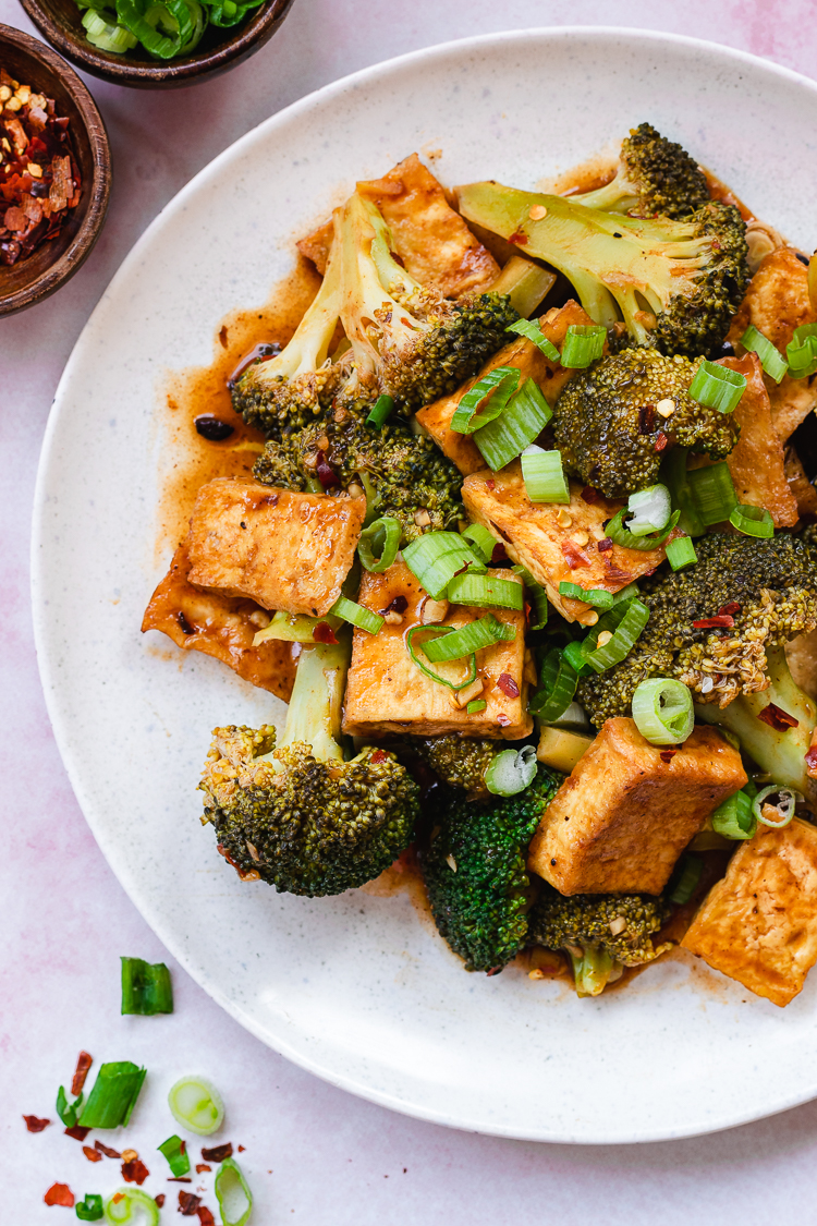 chili sauce tofu and broccoli served on a plate