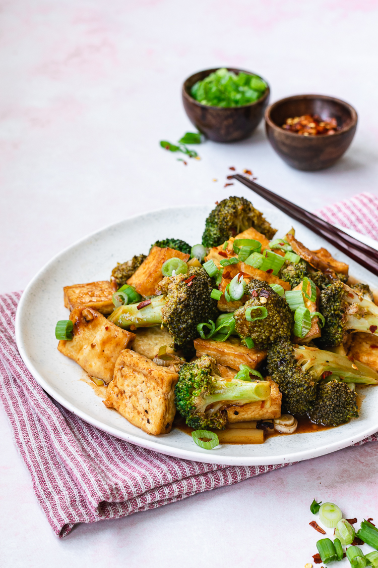 chili sauce tofu and broccoli served on a plate