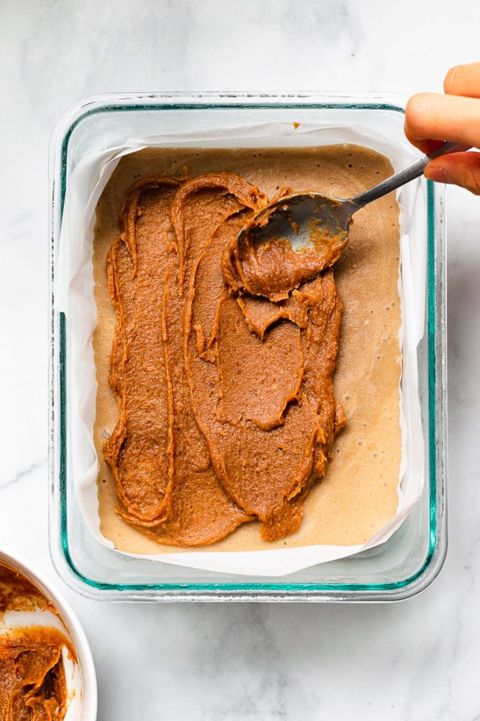 date caramel being spread on top of vegan ice cream base