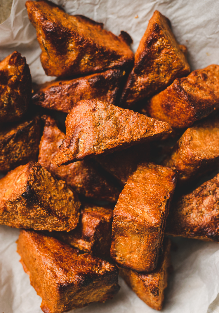 air-fried hoisin peanut tempeh stacked in a bowl