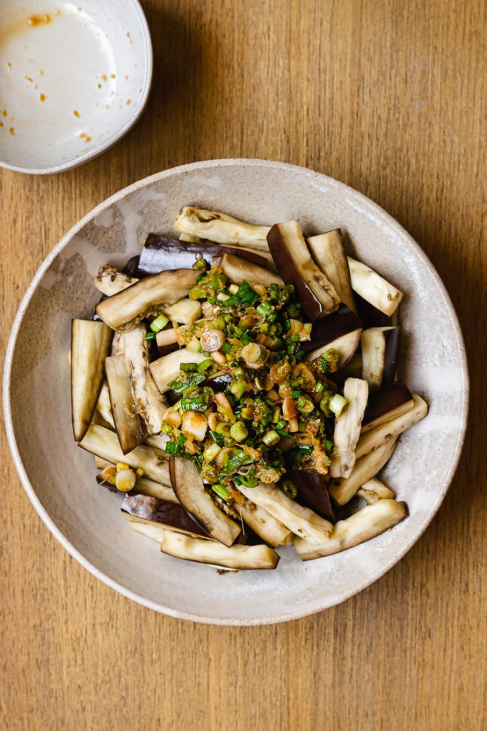 steamed eggplant with green onion dressing poured on top