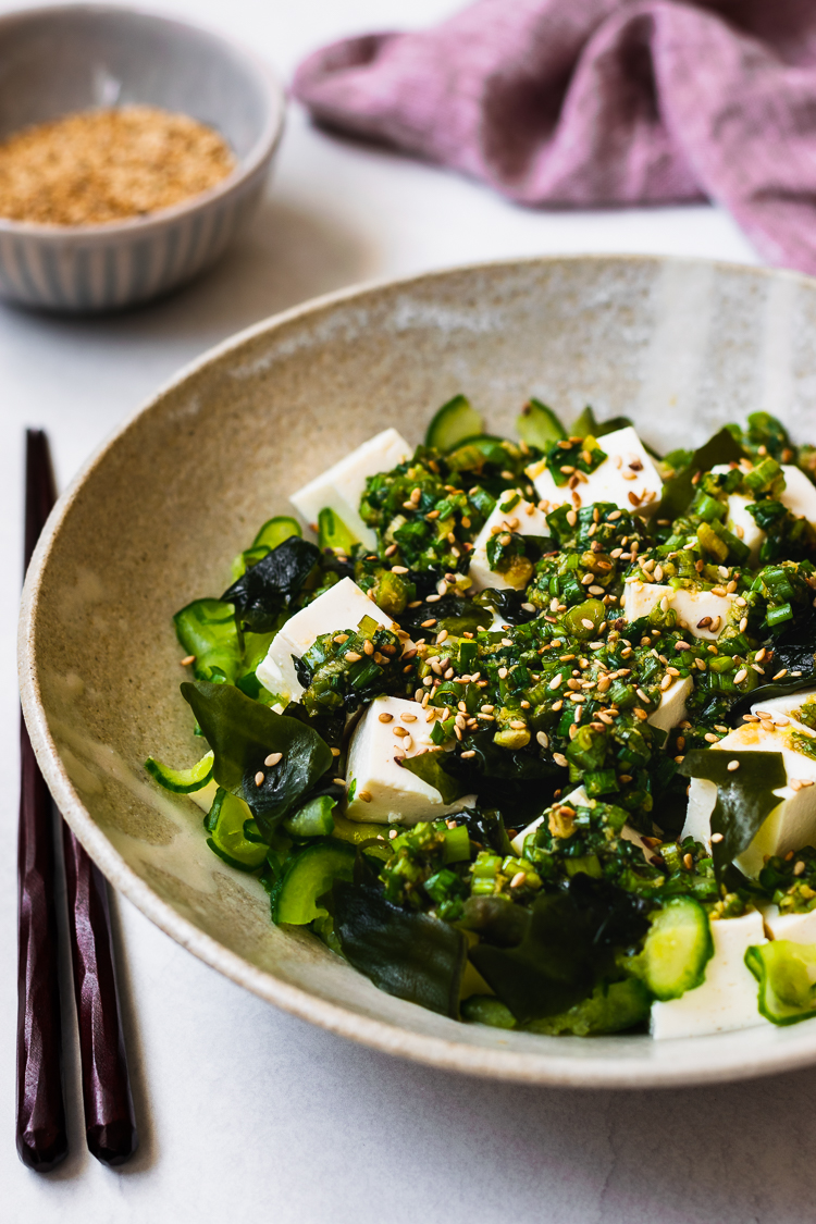 tofu and green onion salad in a plate