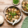 vegan mapo tofu in a bowl, rice bowl on the side