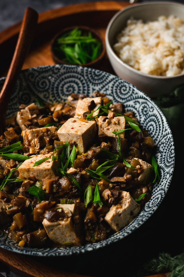 vegan mapo tofu in a bowl with spoon