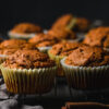 healthy vegan pumpkin muffins cooling on a rack
