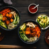 two bowls of bibimbap with tempeh