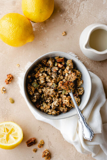lemon tahini granola in a bowl with a spoon