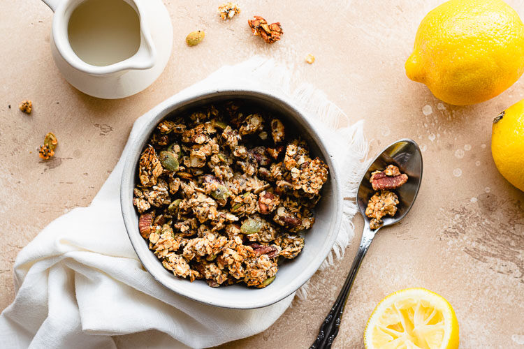 lemon tahini granola in a bowl flatlay