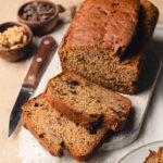 gluten free banana bread sliced, on cutting board