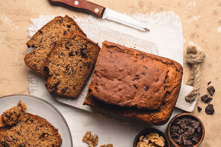 sliced gluten free banana bread on a cutting board