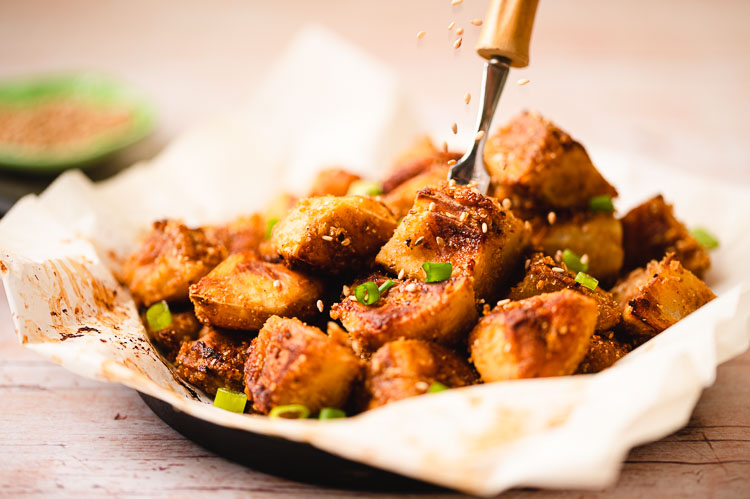 sesame seeds sprinkled on miso roasted potatoes