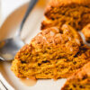 close up of vegan pumpkin scones on a plate