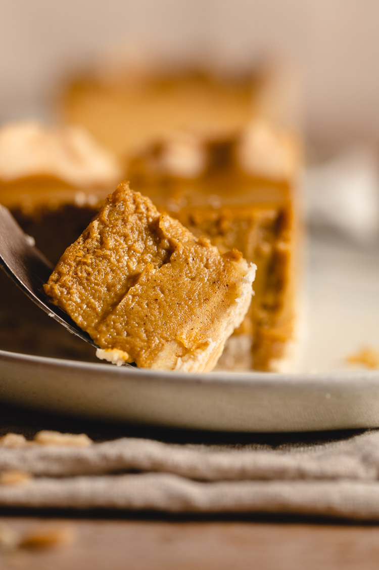 close up bite of vegan pumpkin pie