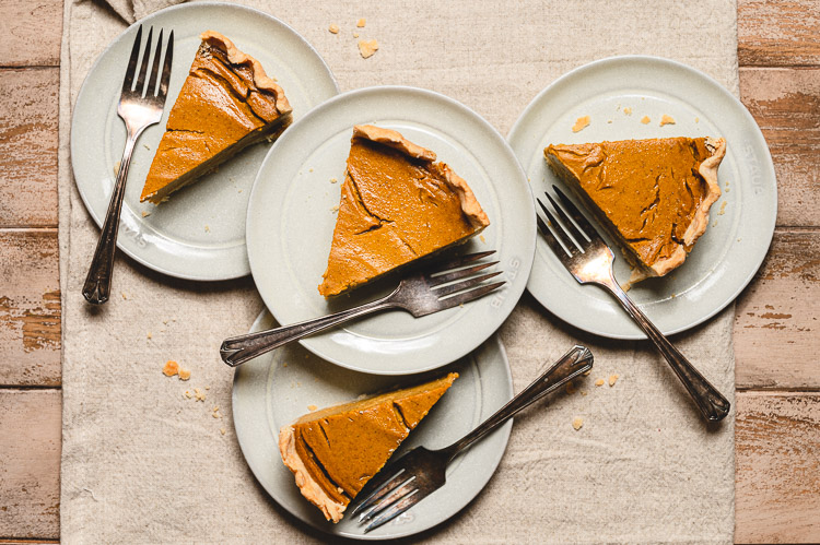 slices of vegan pumpkin pie on plates