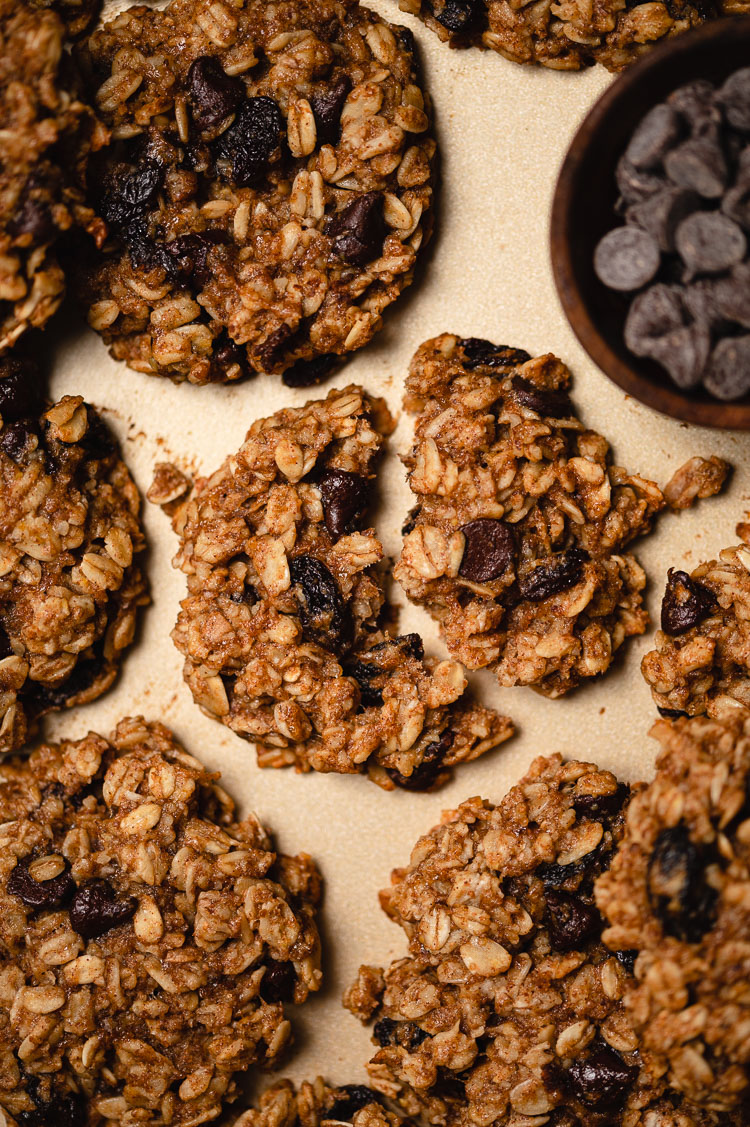 overhead shot of banana oatmeal cookies, one cookie split in half