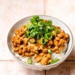 natto over rice, topped with green onions