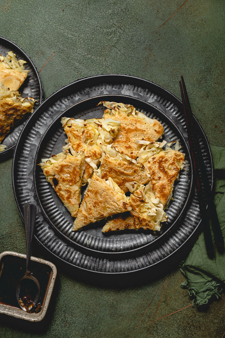 overhead shot of cabbage pancakes on a plate