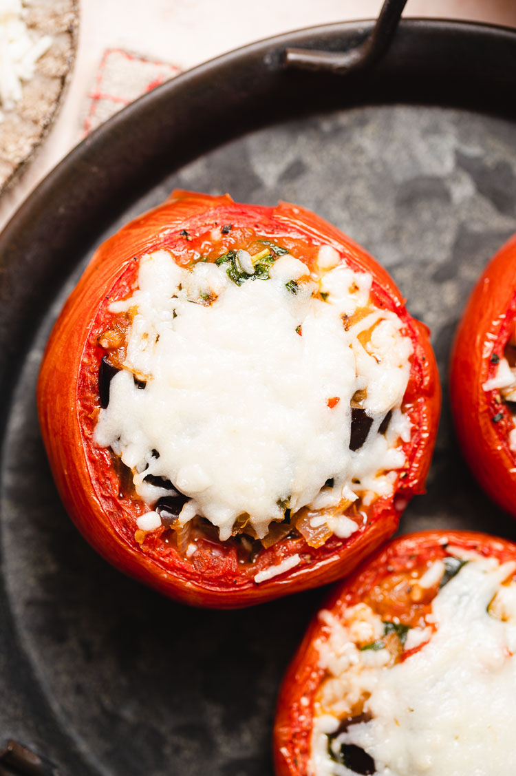 overhead shot of ratatouille stuffed tomatoes