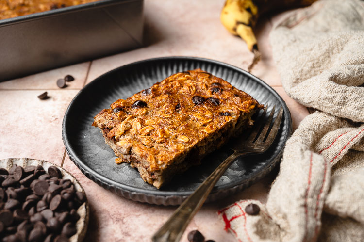 slice of banana bread baked oatmeal on a plate