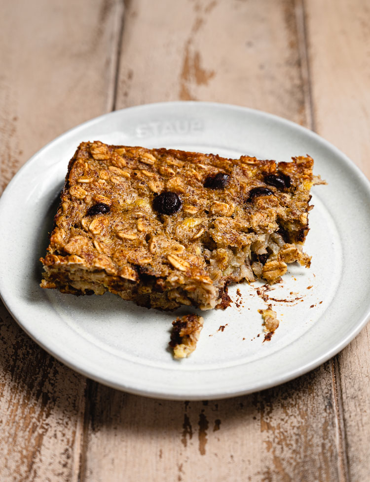 banana bread baked oatmeal with a bite taken out of it