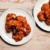 gochujang cauliflower wings on plates