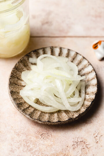 pickled onions on a small plate