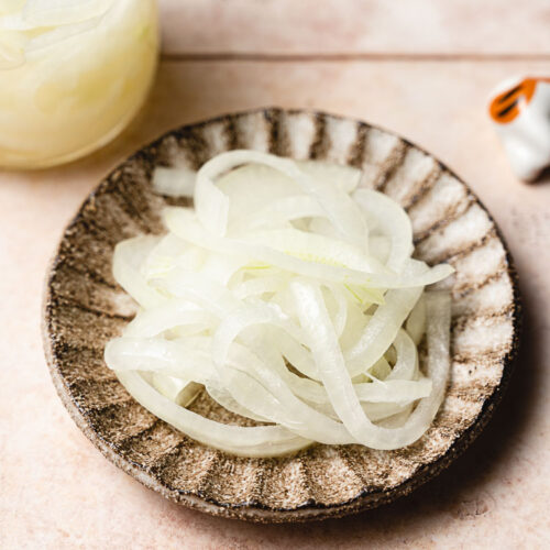 pickled onions on a small plate