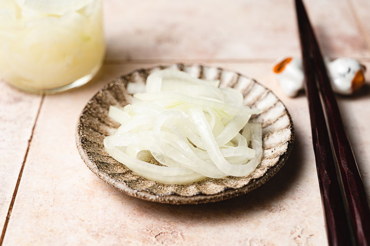 pickled onions on a small plate