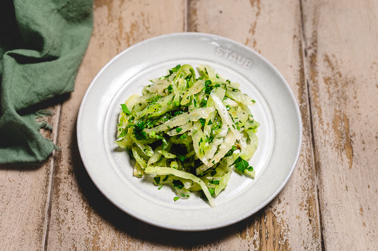 marinated celery salad on a plate