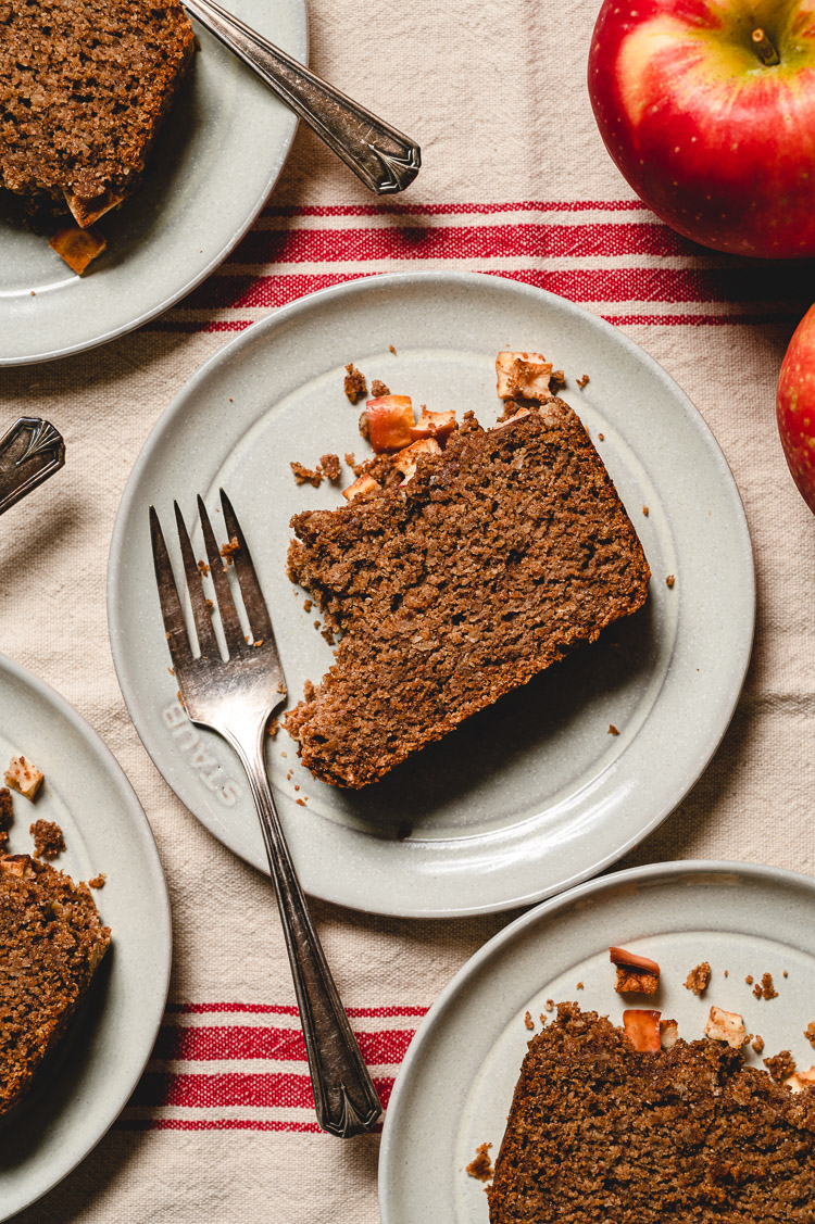 overhead shot of vegan apple bread with a bite taken out of it