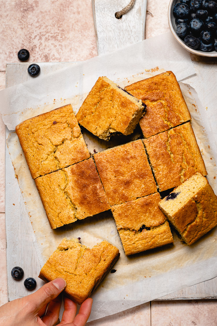 overhead shot of blueberry cornbread cut into squares