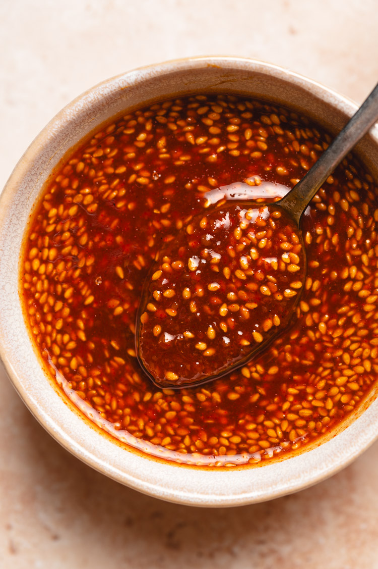 gochujang miso sauce in a bowl with spoon