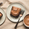 chocolate banana snack cake pieces on plates