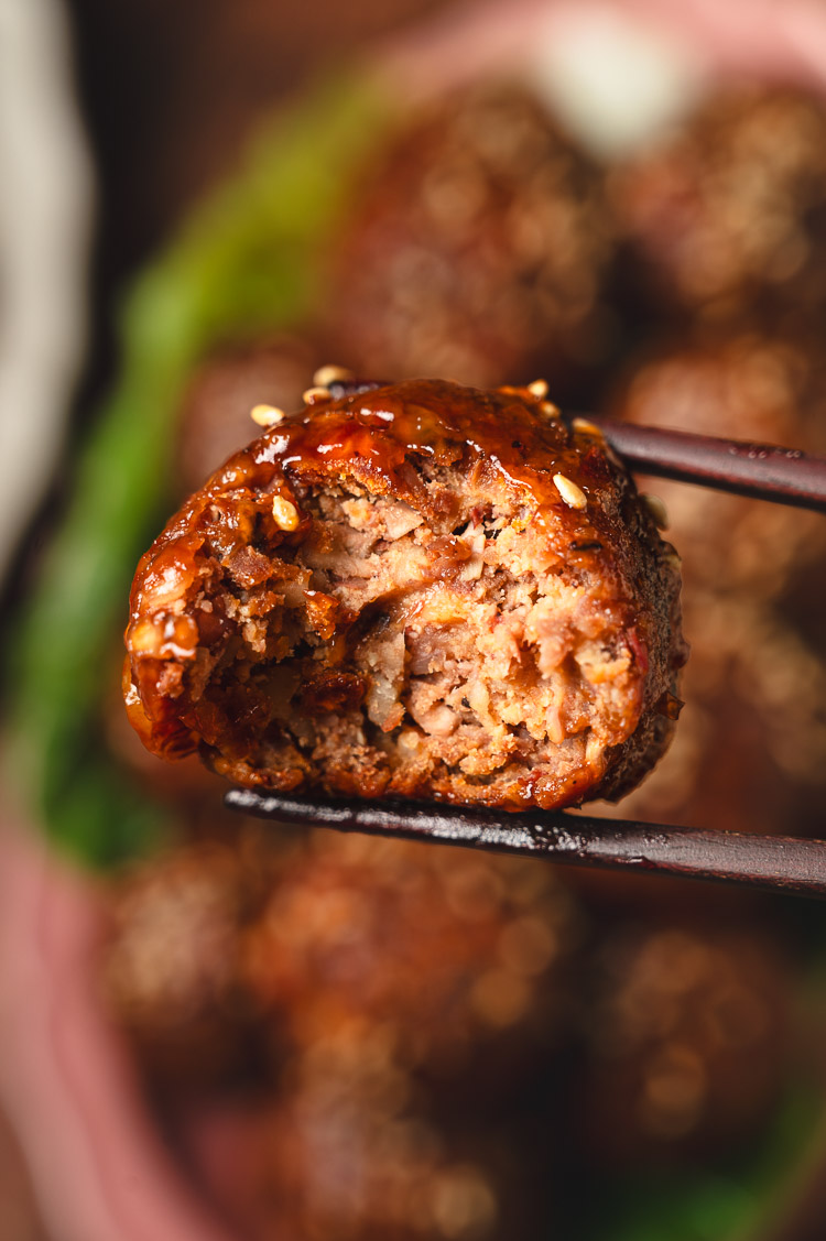 close up of a vegan meatball with a bite taken out of it