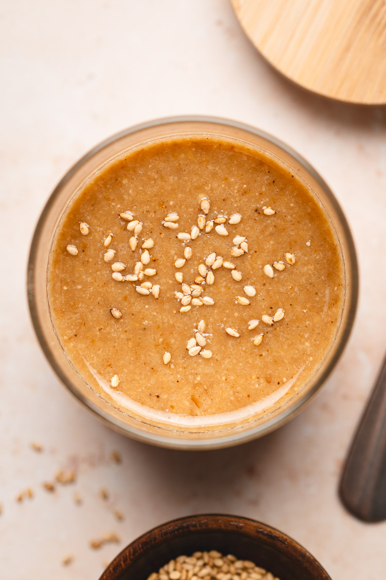 overhead view of japanese sesame dressing in a jar