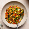 spiced bean salad in a bowl with spoon