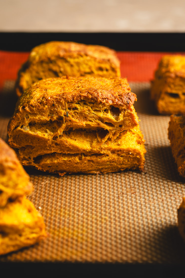 vegan pumpkin biscuit on baking sheet close up