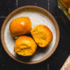 pumpkin dinner rolls on plates