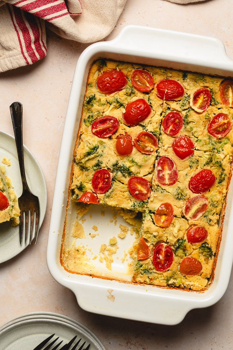 mung bean frittata in pan with one slice on a plate