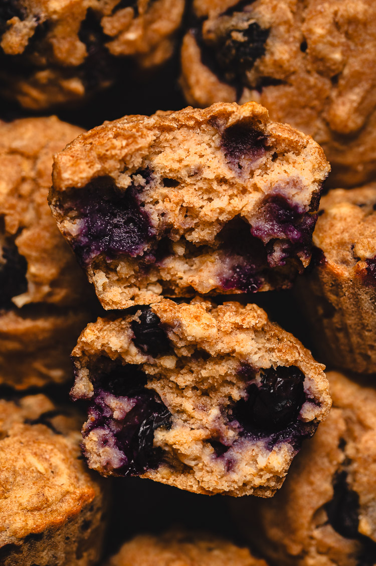 close up vegan blueberry oatmeal muffin cut in half