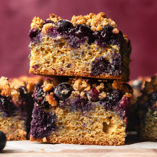 two pieces of blueberry coffee cake stacked
